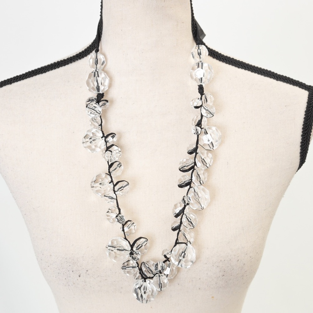 Clear large beaded black ribbon tie statement necklace with contemporary vibe